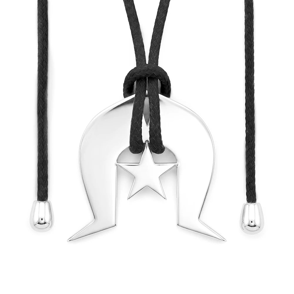 A silver Dhoeri Headdress pendant with , suspended on a black braided cord with silver-toned end caps, shown against a plain white background.